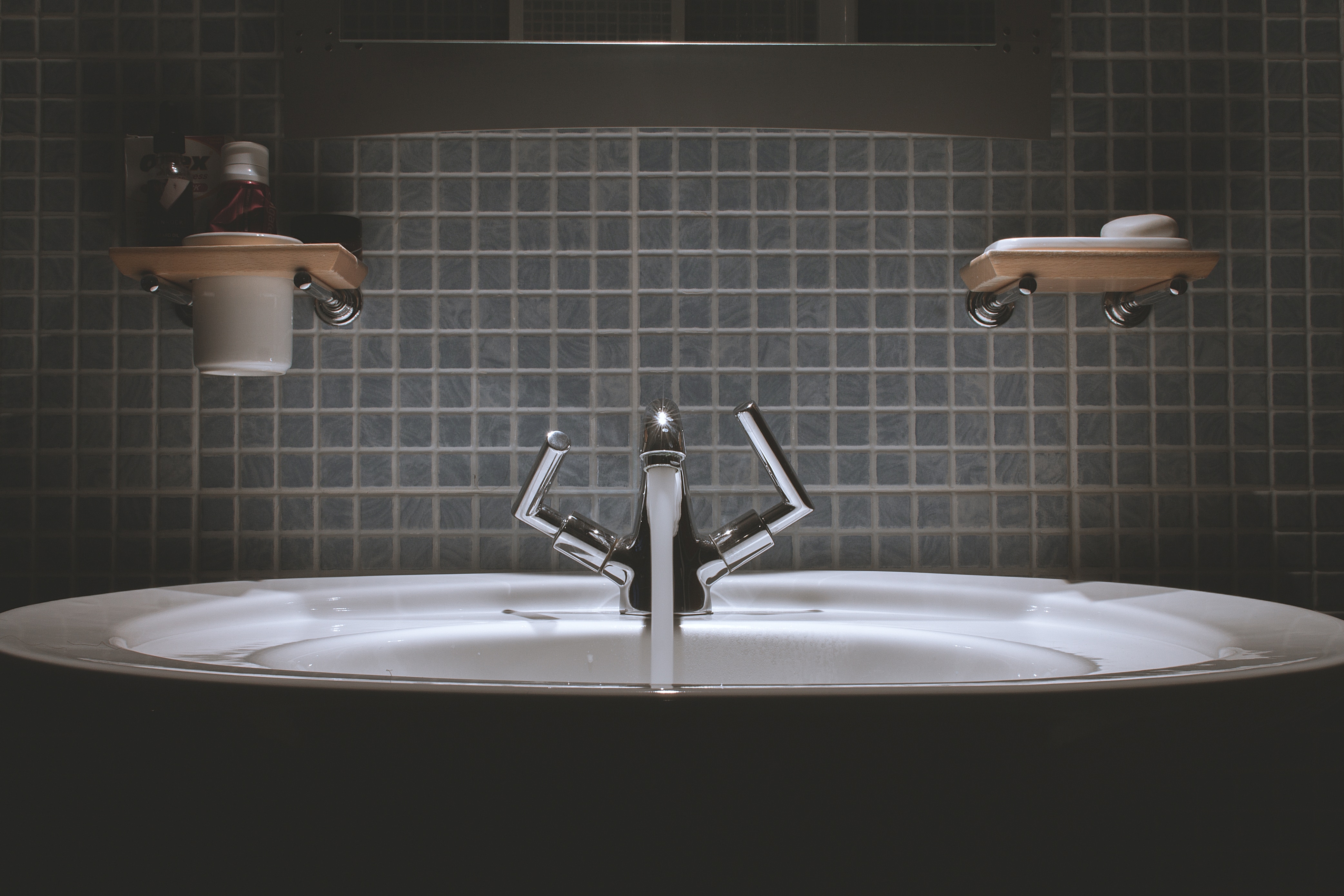 dark picture of a sink for self care