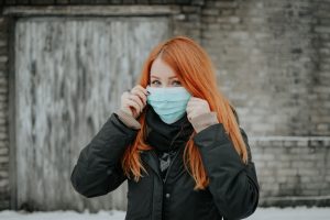 woman with COVID 19 face mask